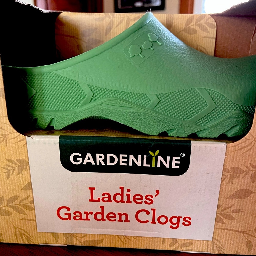 Garden clogs size 9-10. Light green very sturdy - never out of the box.